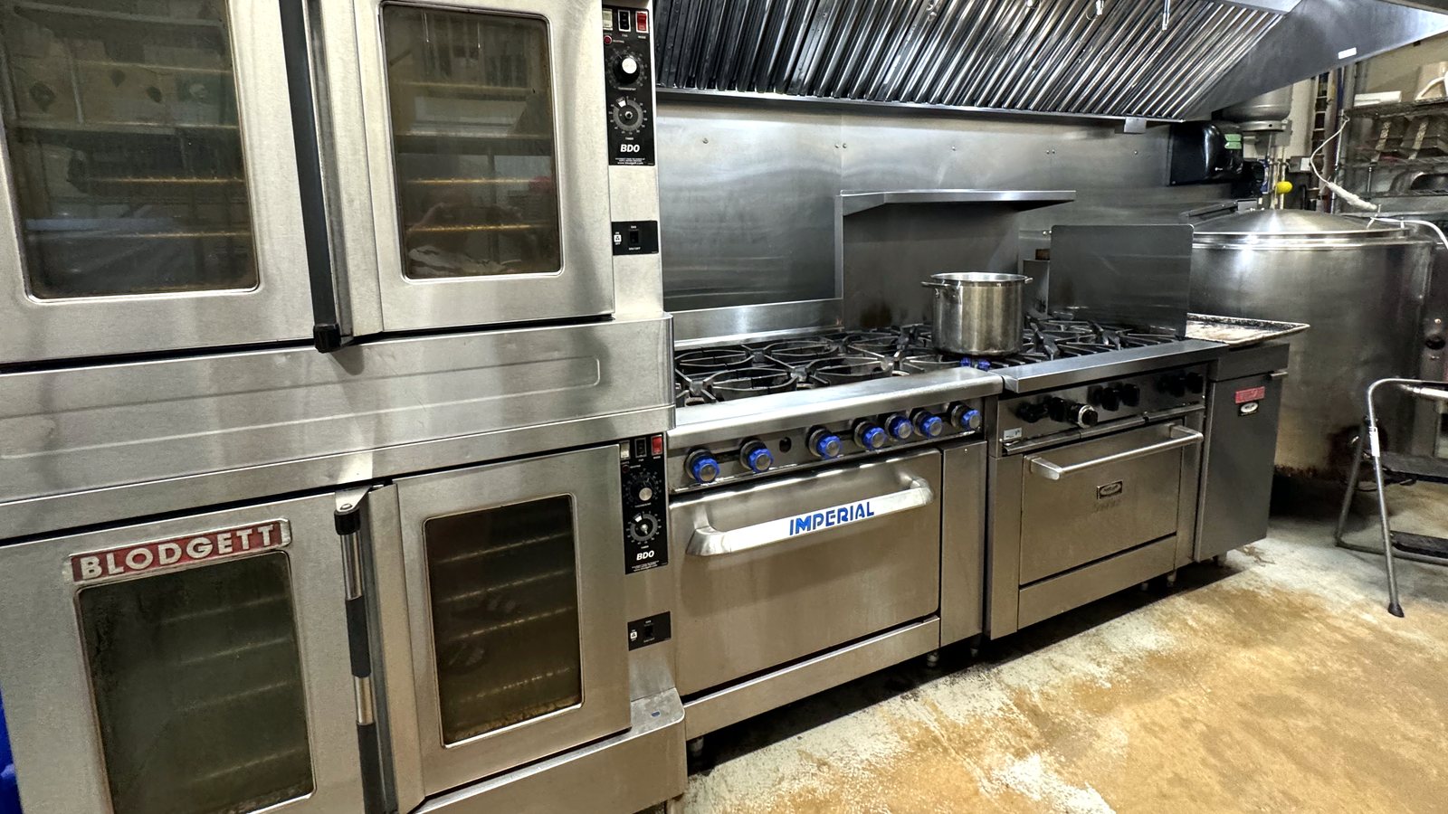 Commercial convection ovens and gas range where Butcher Bravo cooks